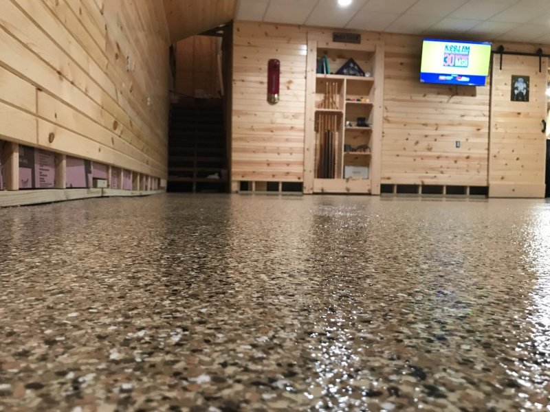 basement with wooden walls after epoxy coating